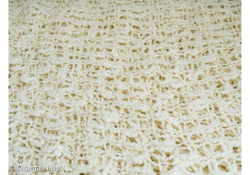 Poncho ivoire crocheté 